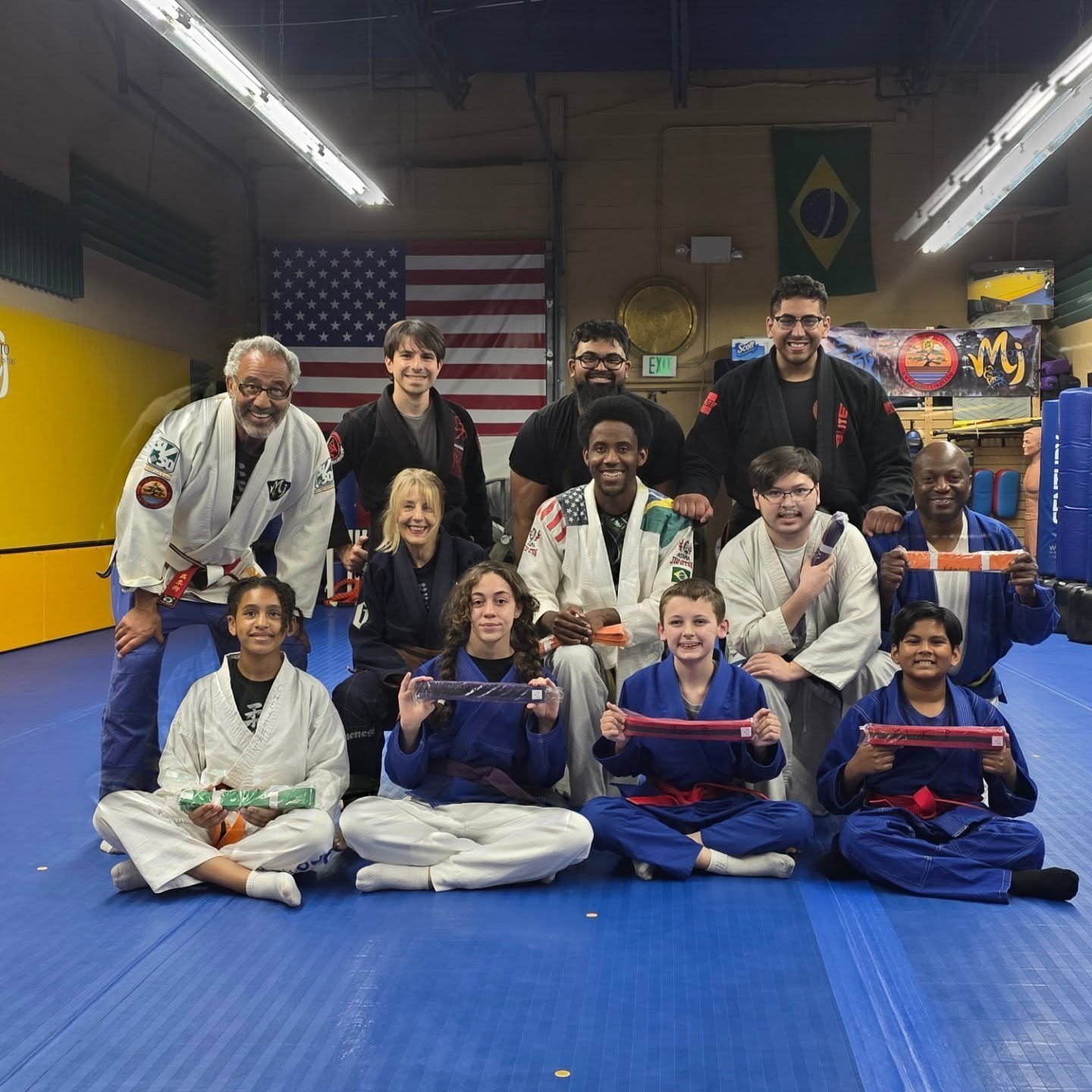 An instructor supervising Get Strong. students closely during class at Makoto Jiu Jitsu Centers in Deer Park