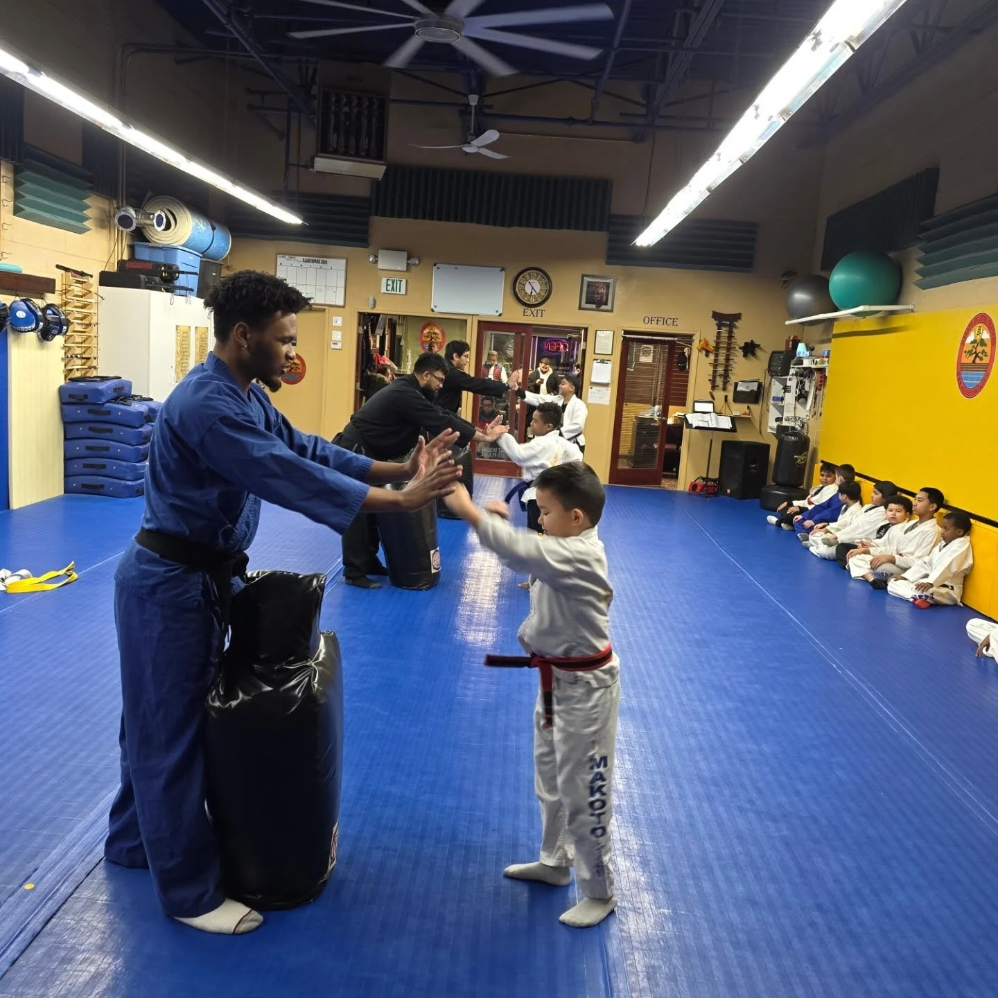 A Is Your Preschooler student smiling proudly after class at Makoto Jiu Jitsu Centers in Deer Park