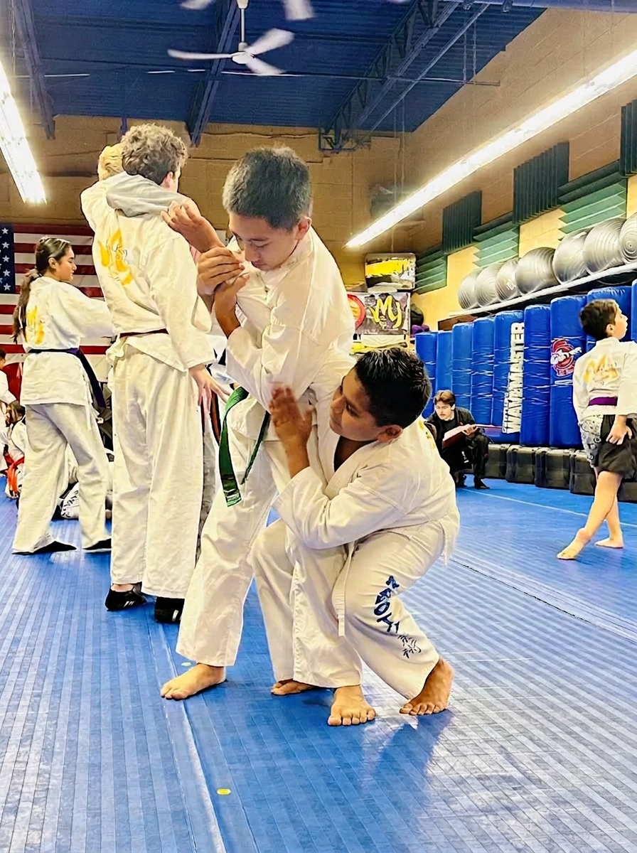 Little Samurai students practicing drills during class at Makoto Jiu Jitsu Centers in Deer Park